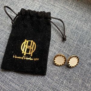 House of Harlow white leather sunburst earrings.
